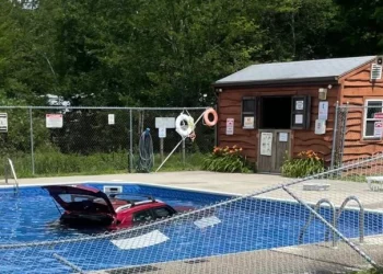 Car in Campground Pool